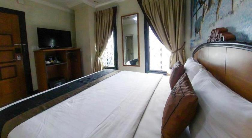 Amos Cozy Hotel Melawai Jakarta Exteriér fotografie