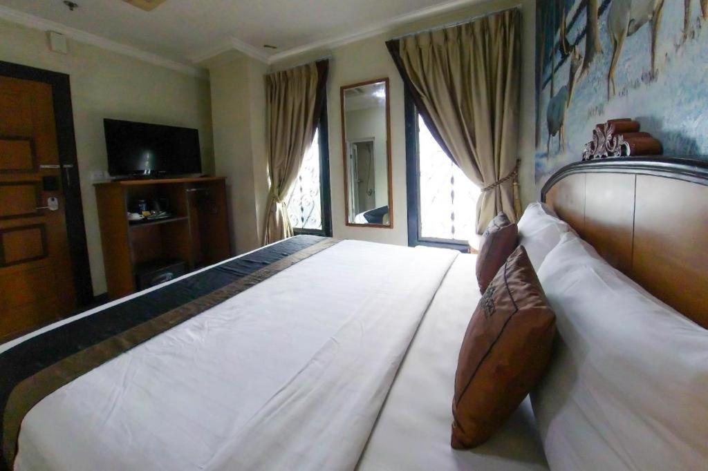 Amos Cozy Hotel Melawai Jakarta Exteriér fotografie